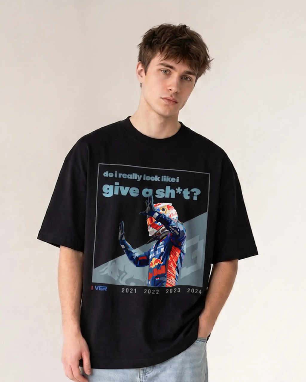 Male model wearing Max Verstappen Attitude Don't Give a Sh*t F1 Unisex Oversized T-shirt Black Front View | Turn1 India