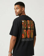 Male model wearing Box Box Pit Stop Formula 1 F1 Oversized Unisex T-shirt Black Back View | Turn1 India