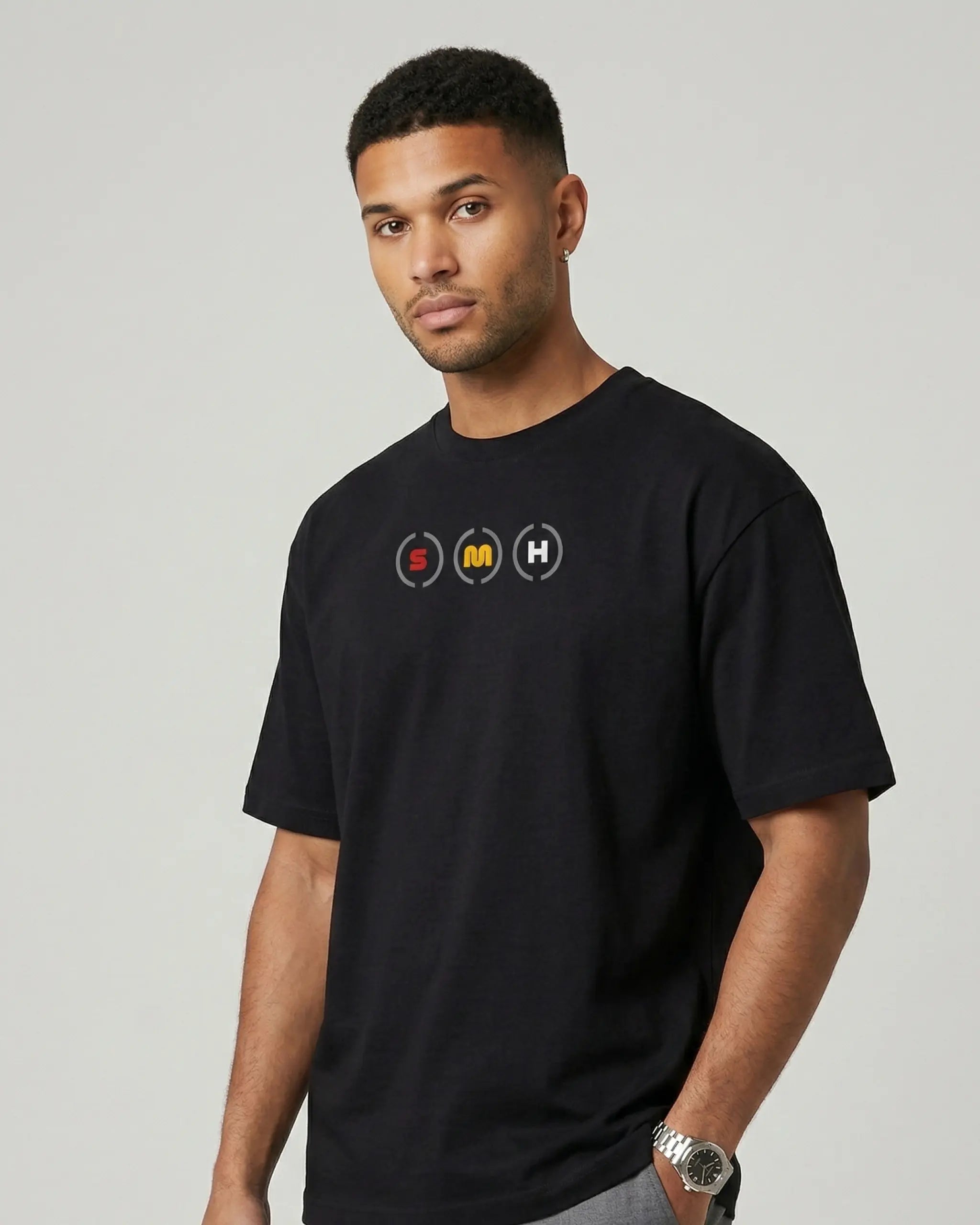Male model wearing Box Box Pit Stop Formula 1 F1 Oversized Unisex T-shirt Black Front View | Turn1 India