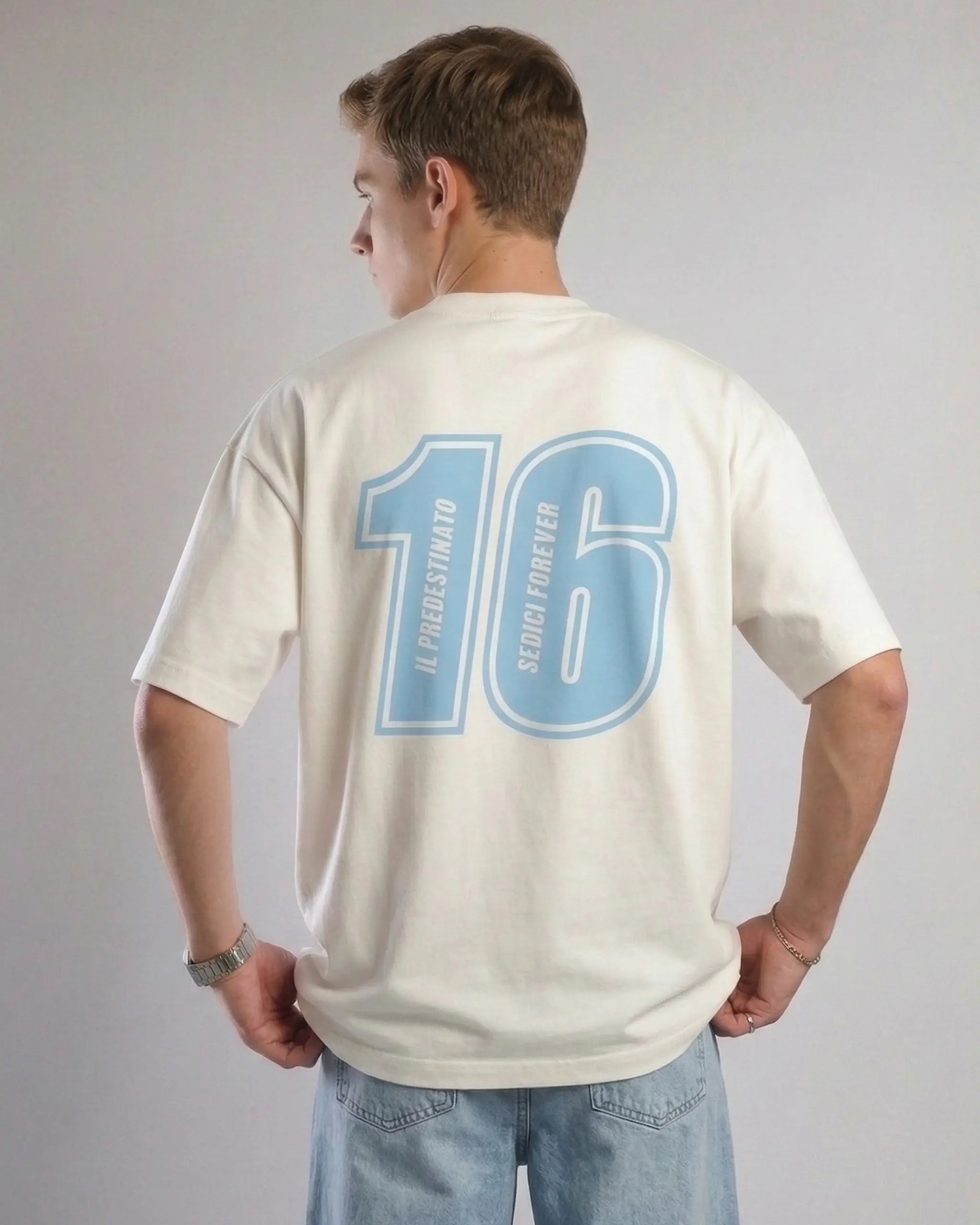 Male model wearing Charles Leclerc Monaco Edition F1 Unisex Oversized T-shirt Off-White Back View | Turn1 India
