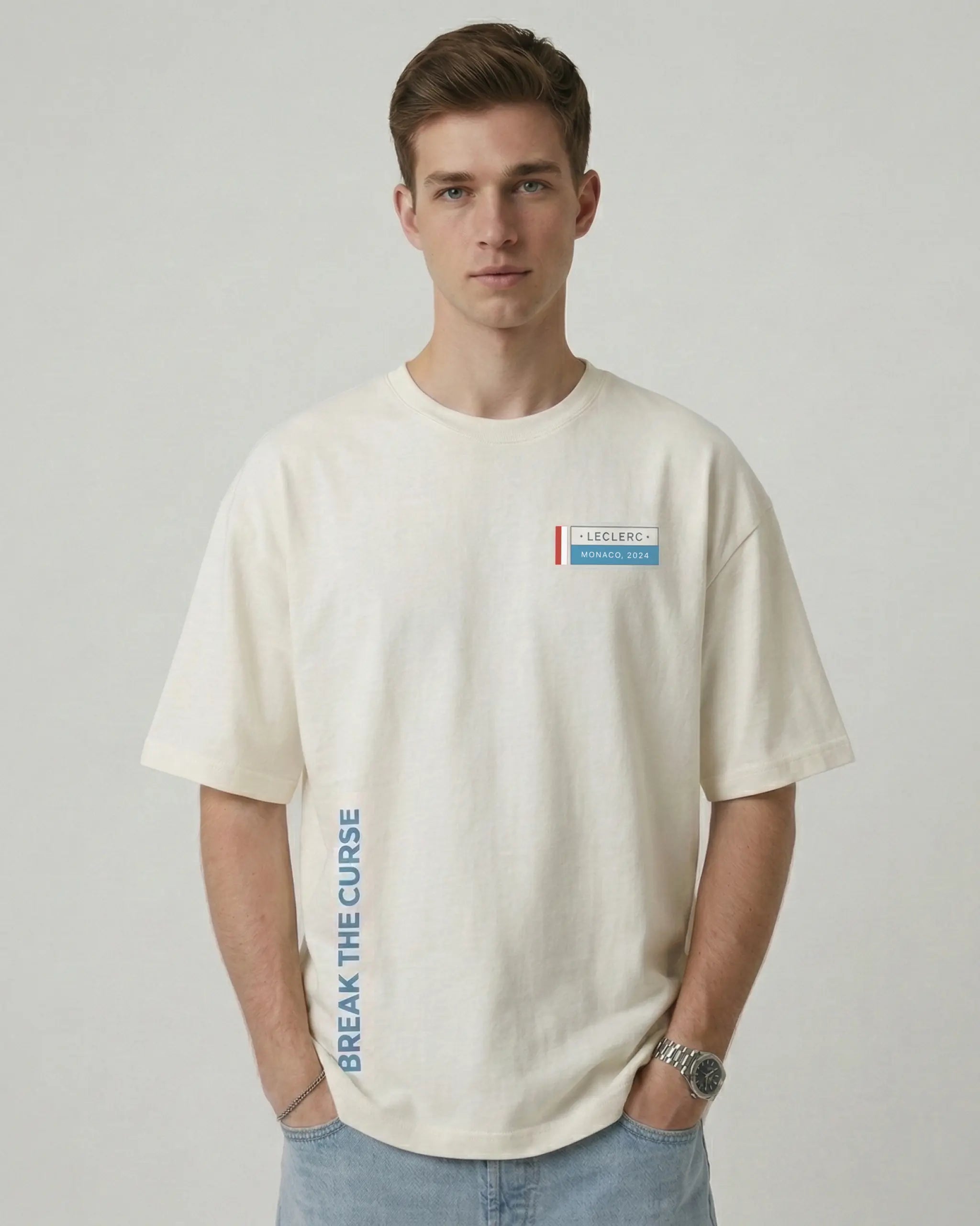 Male model wearing Charles Leclerc Monaco Edition F1 Unisex Oversized T-shirt Off-White Front View | Turn1 India