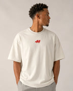 Male model wearing Lewis Hamilton Quote Remember Who You Are Fan Ferrari Graphic F1 Unisex Oversized T-shirt Off-White Front View | Turn1 India | Premium Cotton