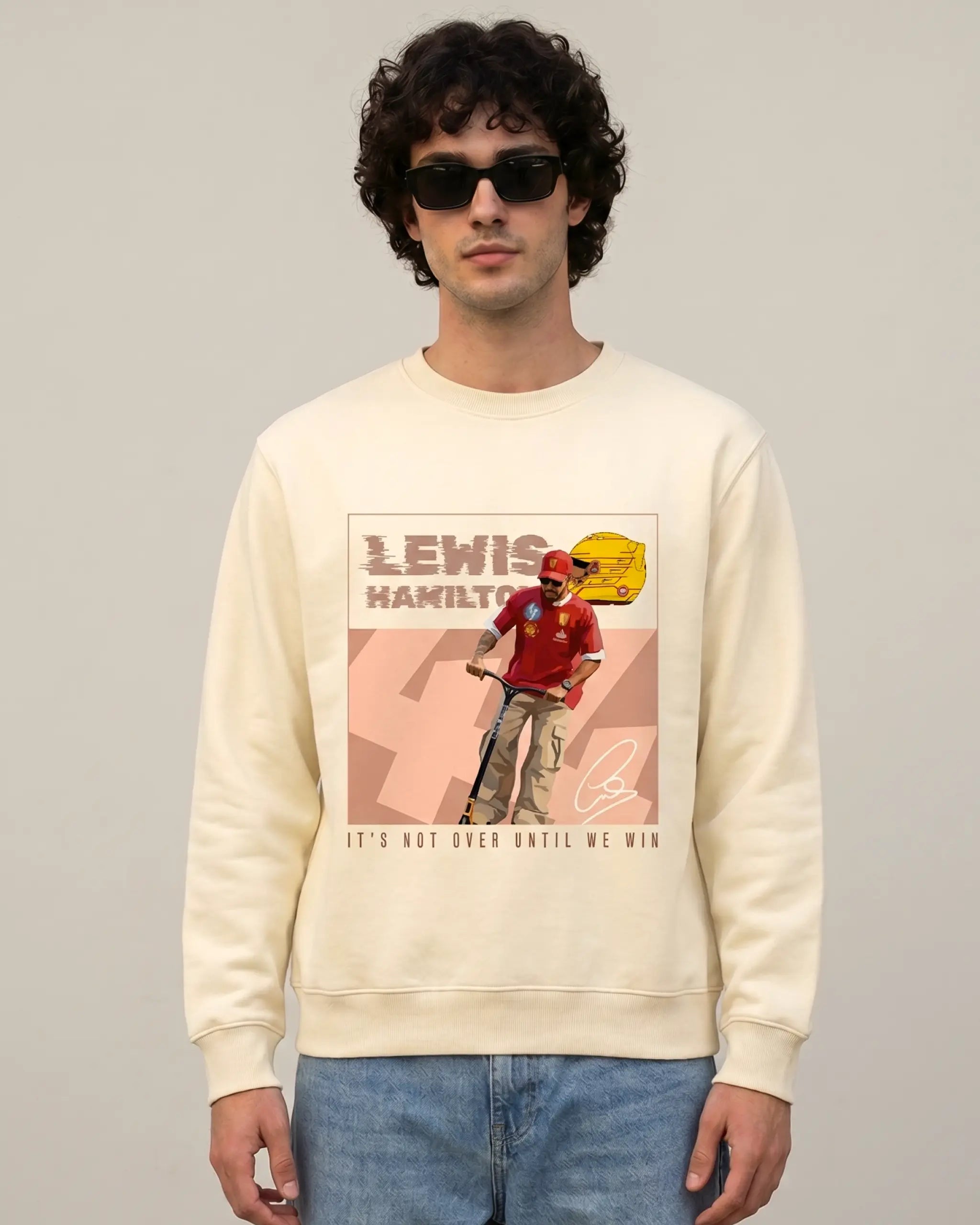 Male model wearing Lewis Hamilton Scooter F1 Unisex Sweatshirt Cream Colour Front View with crew neck - with Lewis Hamilton scooter graphic and helmet on the front featuring his racing number Lewis 44 -Turn1 India