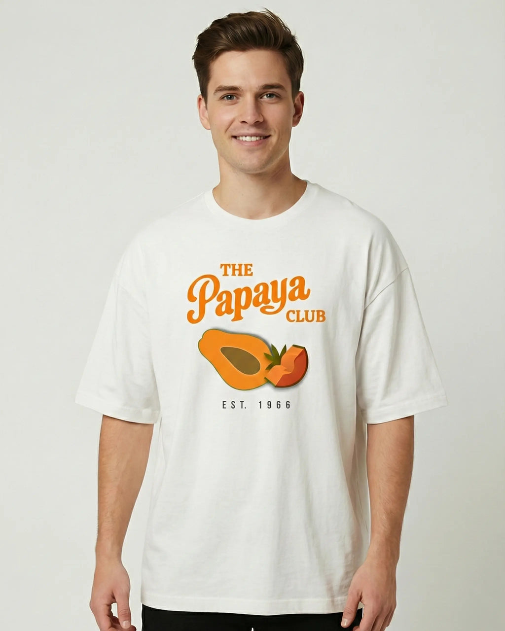 Male model wearing Papaya Club McLaren F1 Unisex Oversized T-shirt Off-White Front View | Turn1 India