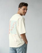 Male model wearing Suzuka Circuit Japan Grand Prix F1 Unisex Oversized Graphic T-shirt Off-White Side View | Turn1 India