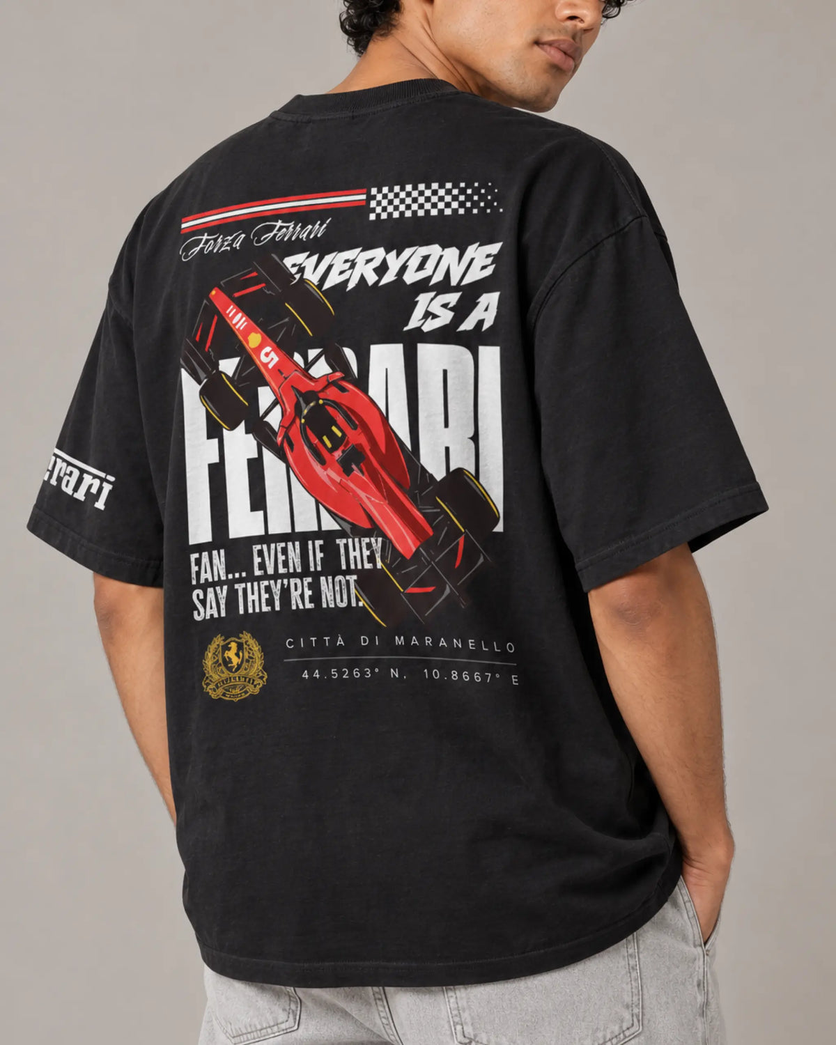 Male model man wearing Everyone loves Ferrari F1 T-shirt Black Back View | Unisex Oversized Formula 1 T-shirt | Ferrari T-shirt | Turn1 India 