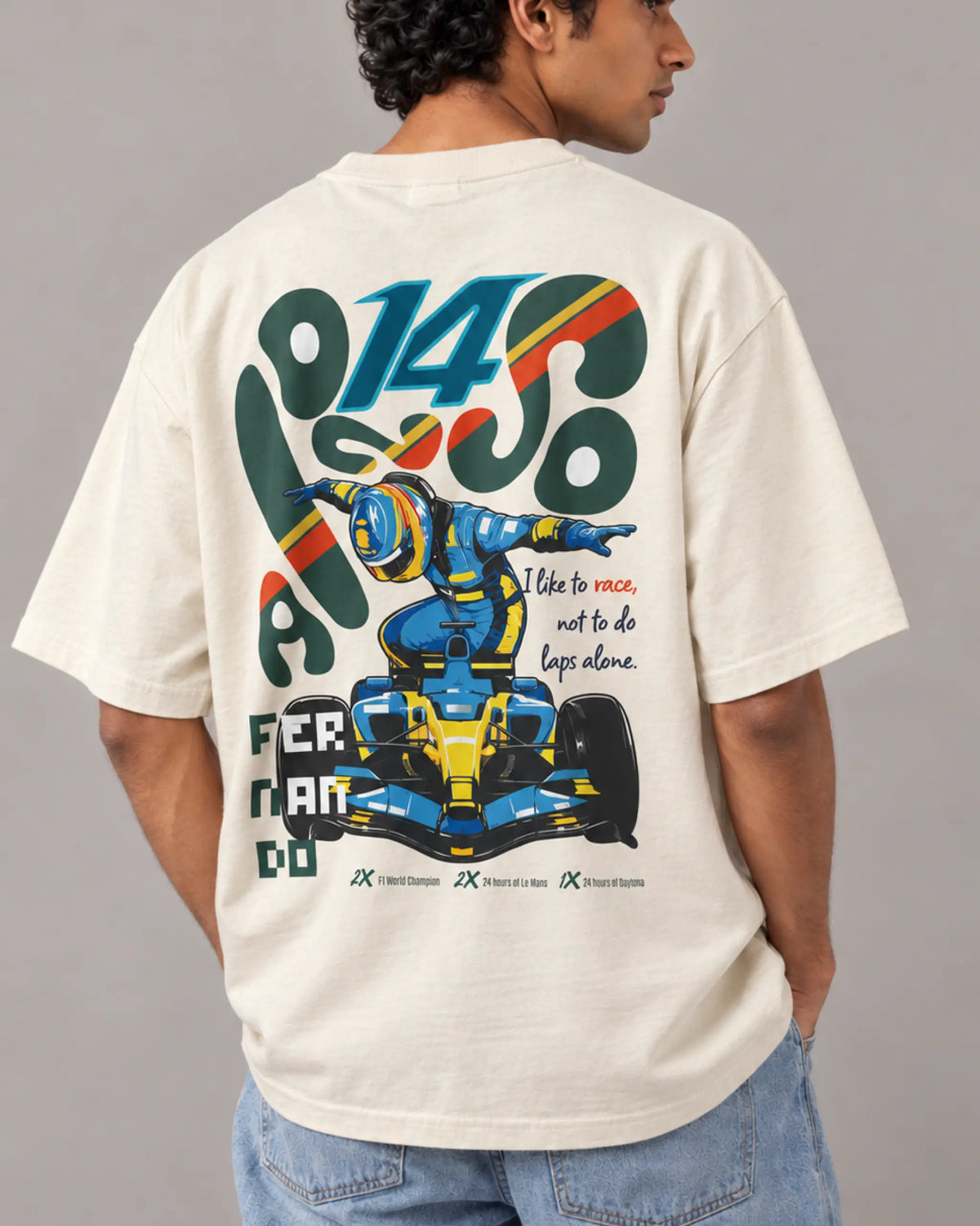 Male model man wearing Fernando Alonso El Nano Legacy Unisex Oversized F1 T-shirt | Formula 1 T-shirt | Off-White | Back View | Turn1 India