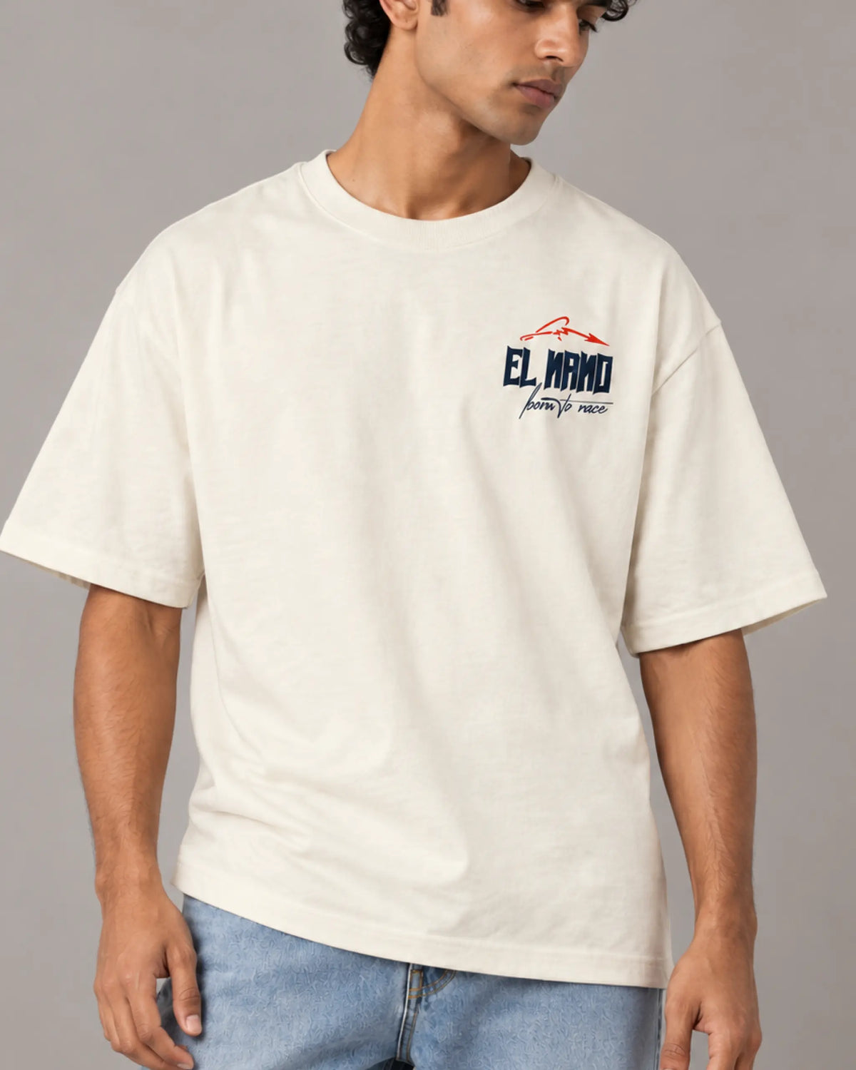 Male model man wearing Fernando Alonso El Nano Legacy Unisex Oversized F1 T-shirt | Formula 1 T-shirt | Off-White | Front View | Turn1 India