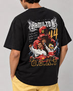 Male model man wearing Formula 1 Tee | Lewis Hamilton GOAT F1 T-shirt | Unisex Oversized Fit | Black | Back View | Turn1 India
