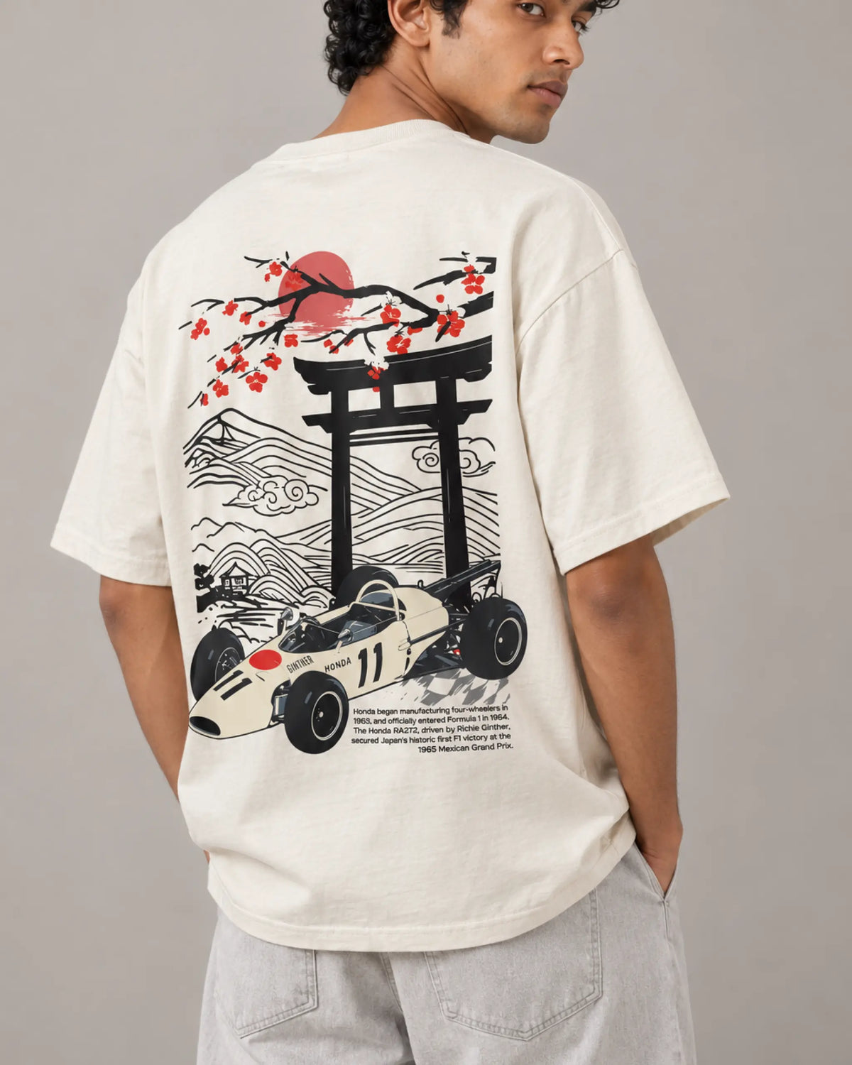 Male model man wearing Tokyo Race Vibes F1 Unisex Oversized T-shirt Off-White Back View | Turn1 India
