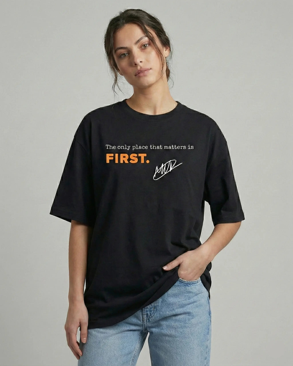 Female model wearing Max Verstappen F1 Unisex Oversized T-shirt Black Colour Front View | Turn1 India