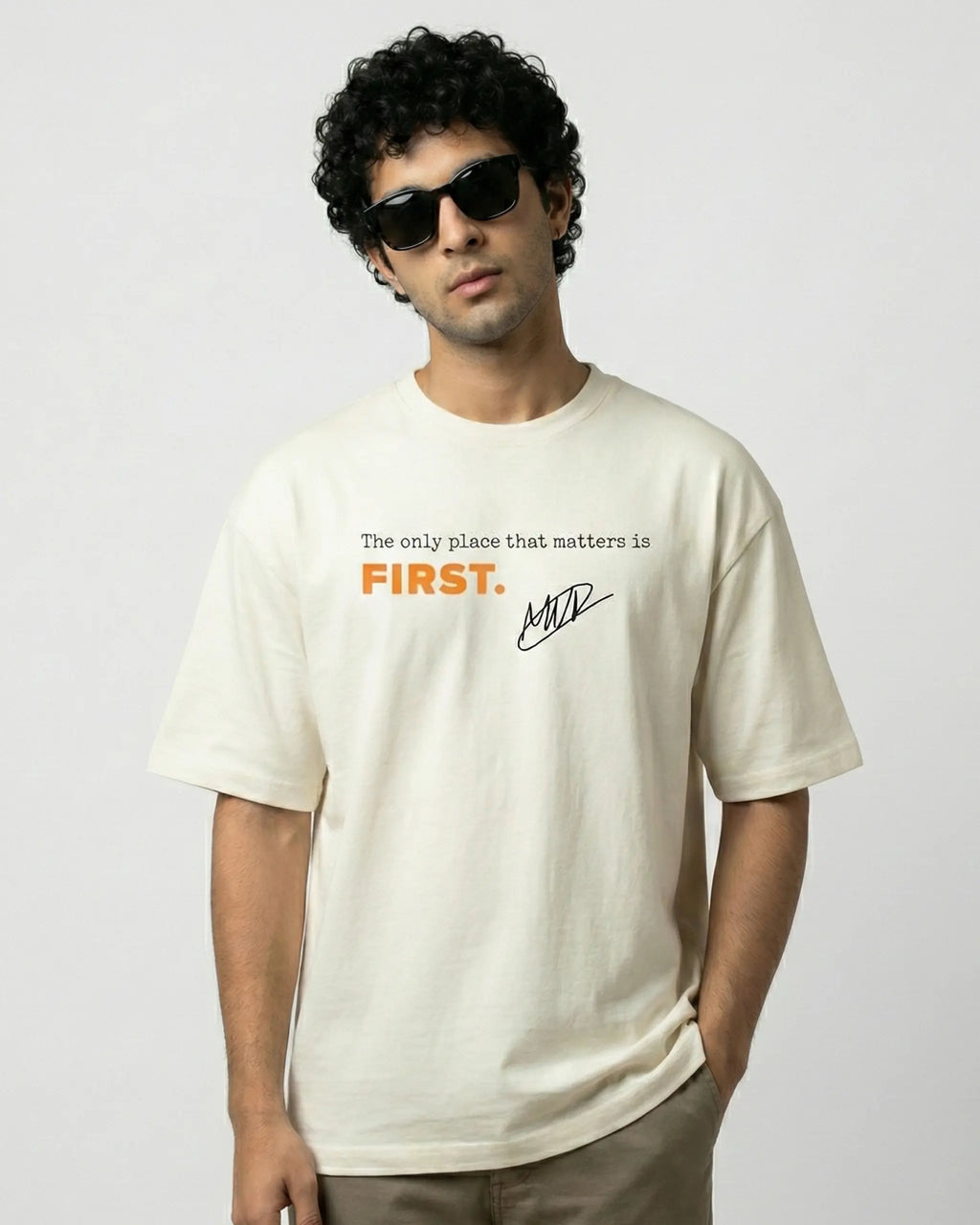 Male model wearing Max Verstappen F1 Unisex Oversized T-shirt Off-White Colour Front View | Turn1 India