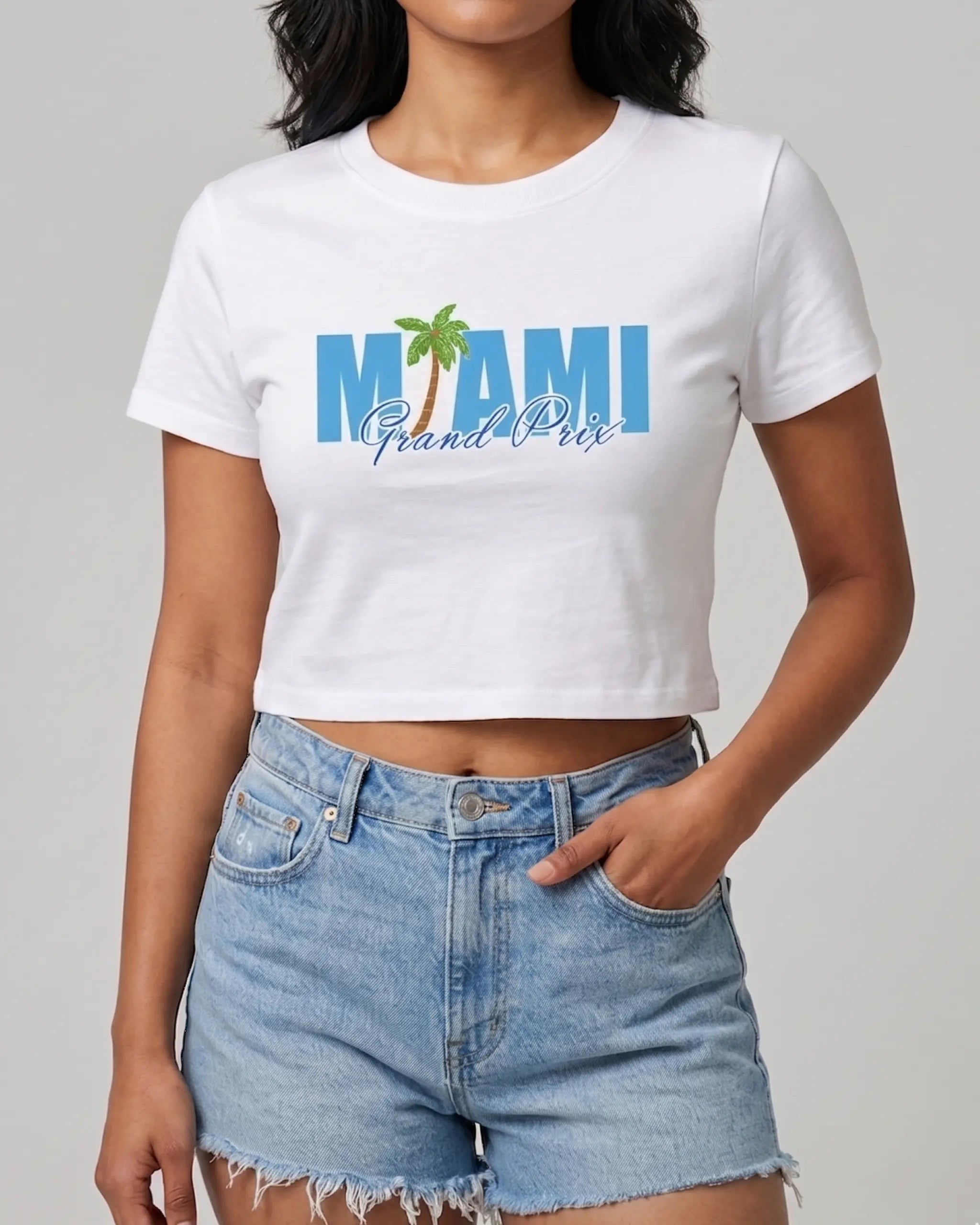 White Miami Grand Prix F1 crop T-shirt with blue “Miami” and “Grand Prix” logo graphic