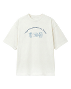 Off‑White Unisex‑Tee, zentraler F1‑Motivprint mit Schrift „This the Season to Race“