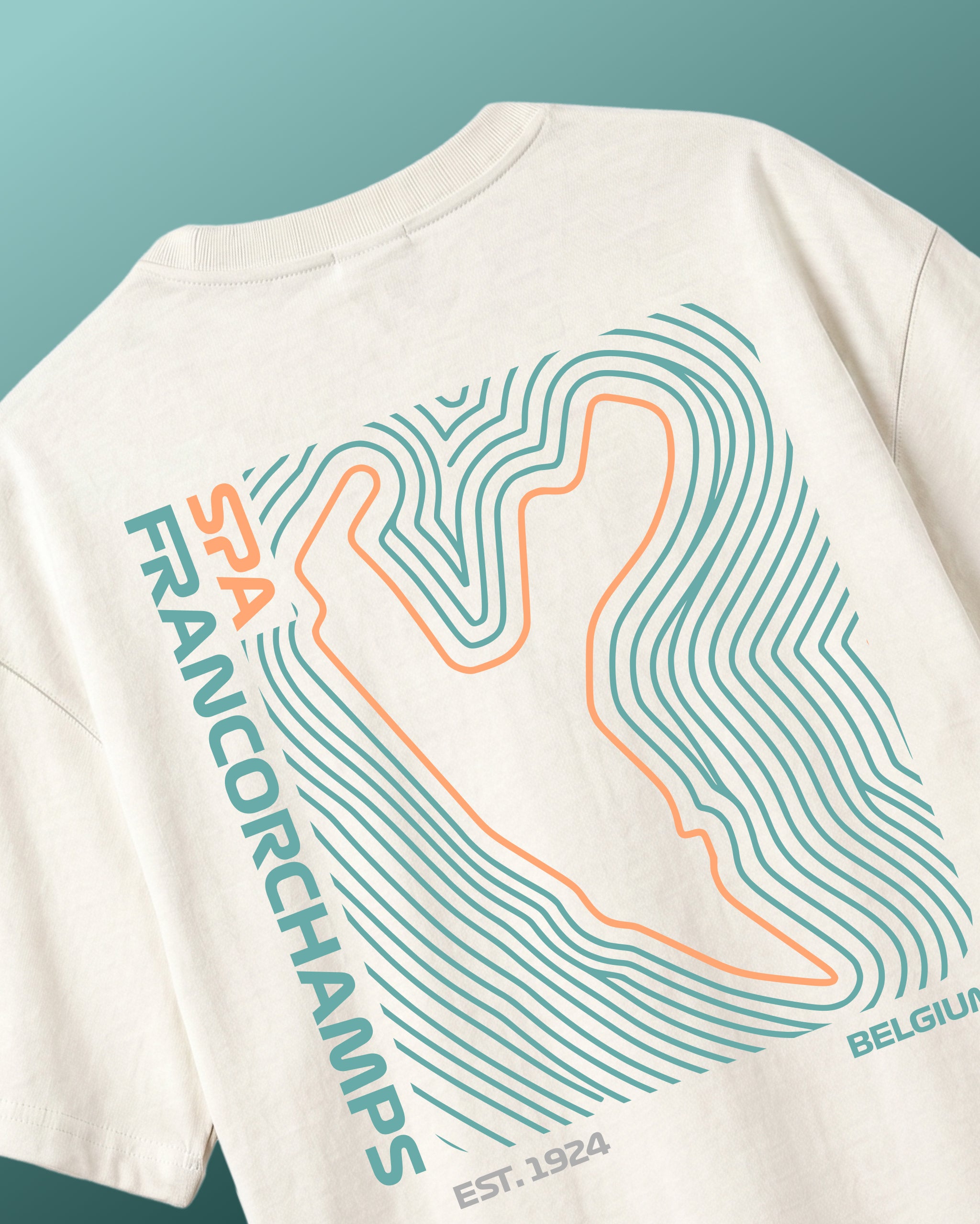 F1 Off-white unisex oversized T-shirt by Turn 1 Brand, an F1 Apparel brand of India. Back print features Spa Francorchamps Belgium GP F1 circuit.
